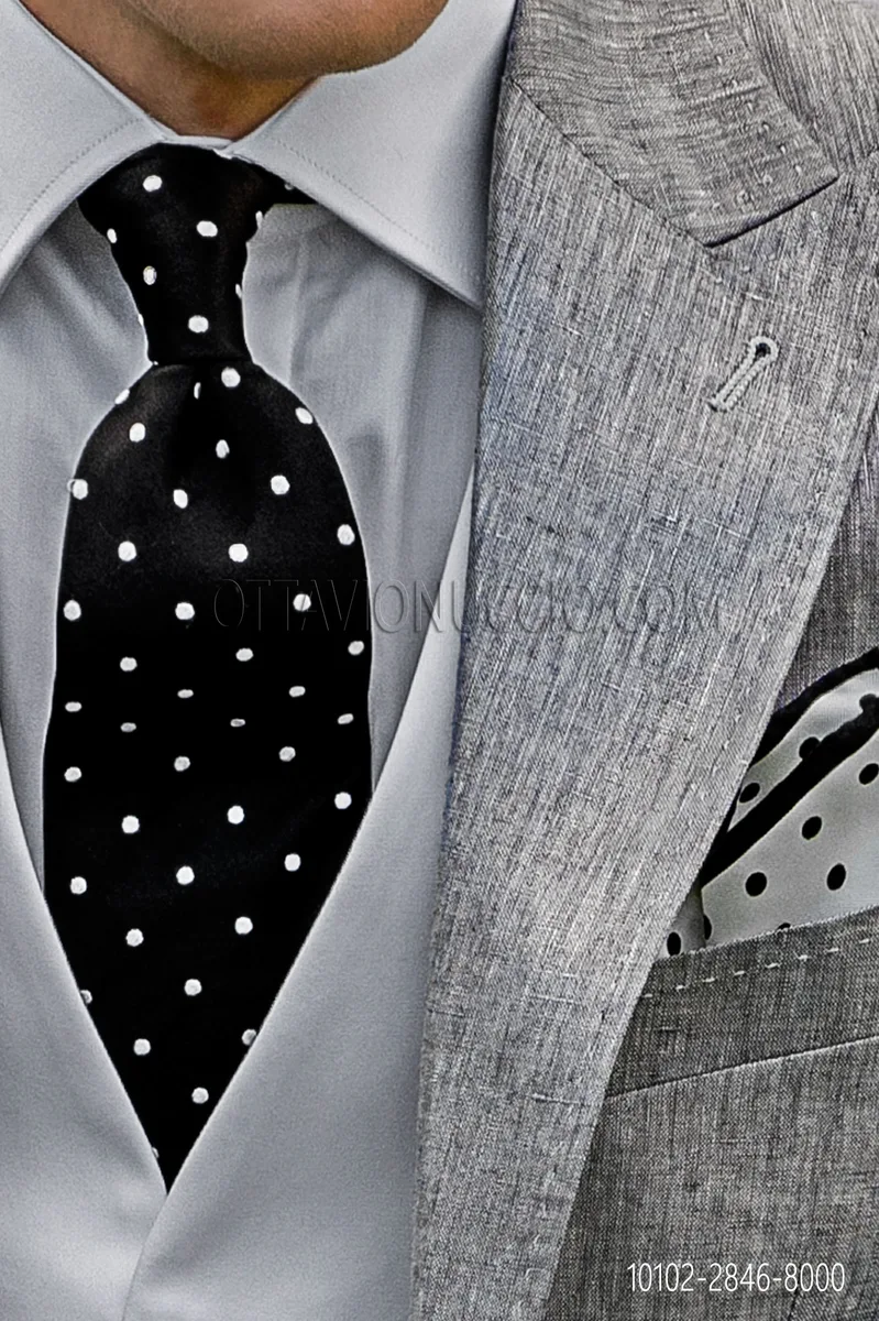 Tie in black pure silk with white polka dots