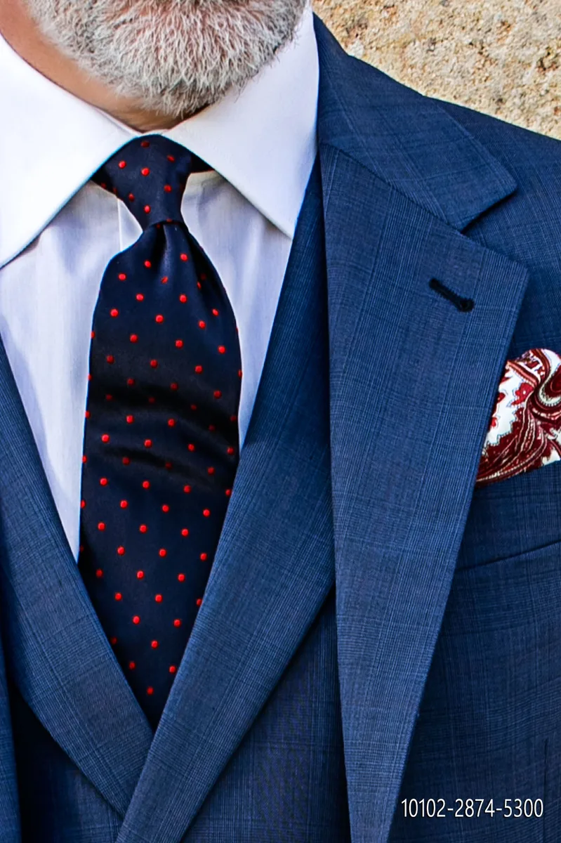 Cravate en pure soie bleue à pois rouges