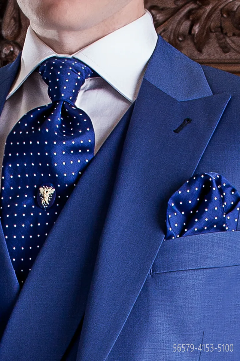 Cravattone da annodare e fazzoletto blu con pois bianchi
