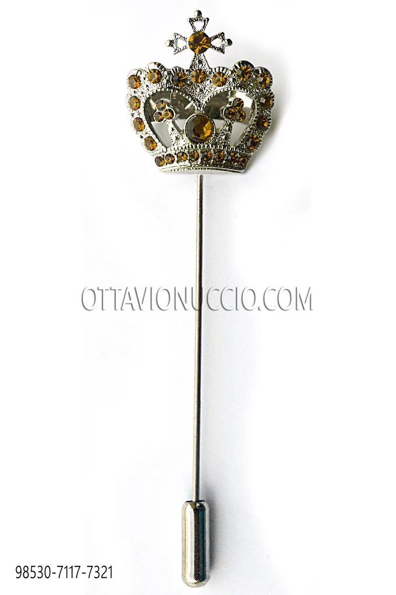 Silver tone crown tie pin with topaz tone rhinestones