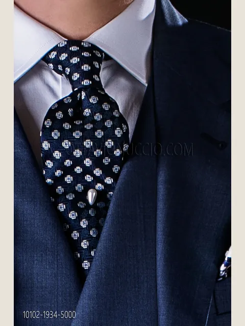 Tie in blue pure silk with geometric micro-patterns