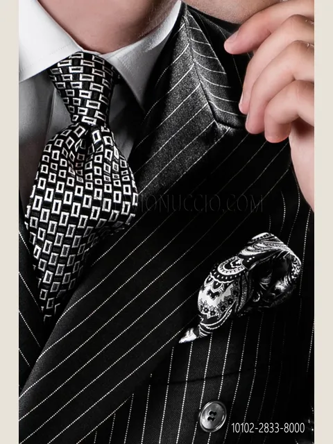 Tie in black pure silk with white patterns