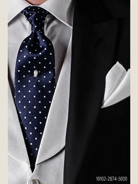 Tie in blue silk with white polka dots