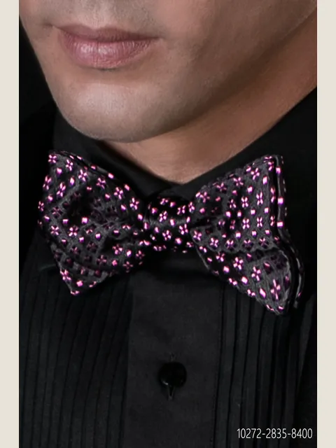 Knotted bow tie in black pure silk with purple patterns