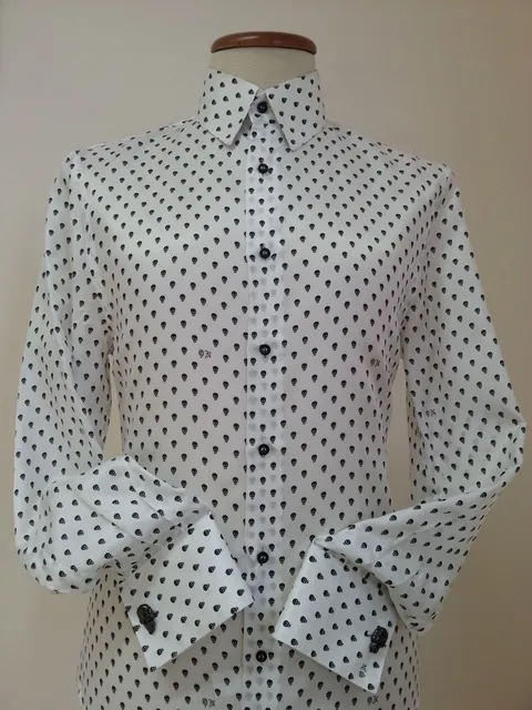 White shirt with black skulls and cufflinks