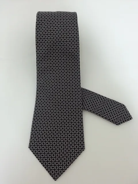 Tie and handkerchief in black silk with geometric patterns