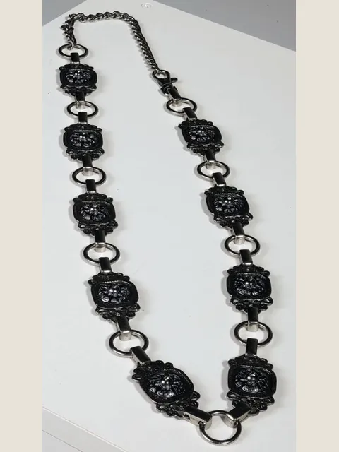 Metal belt with antiqued nickel finish