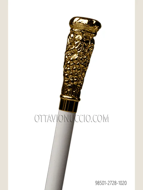 White cane with gold knob