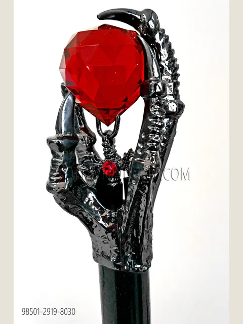 Black cane with gunmetal grey dragon claw and red sphere