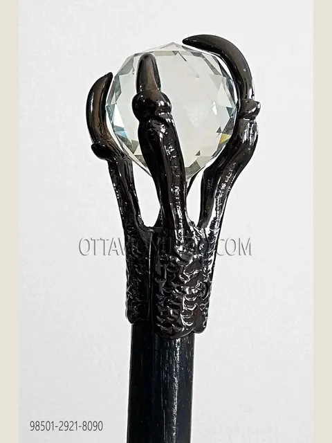 Black cane with gunmetal grey claw and crystal sphere