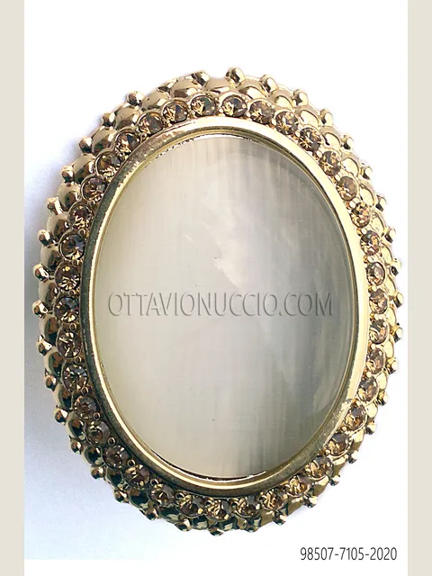 Knot holder with cameo and topaz rhinestones