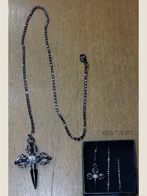 Chain with small sword pendant in smoke