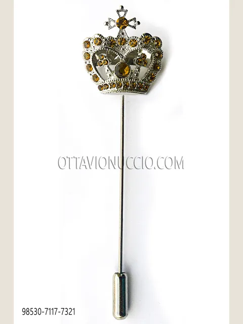 Silver tone crown tie pin with topaz tone rhinestones