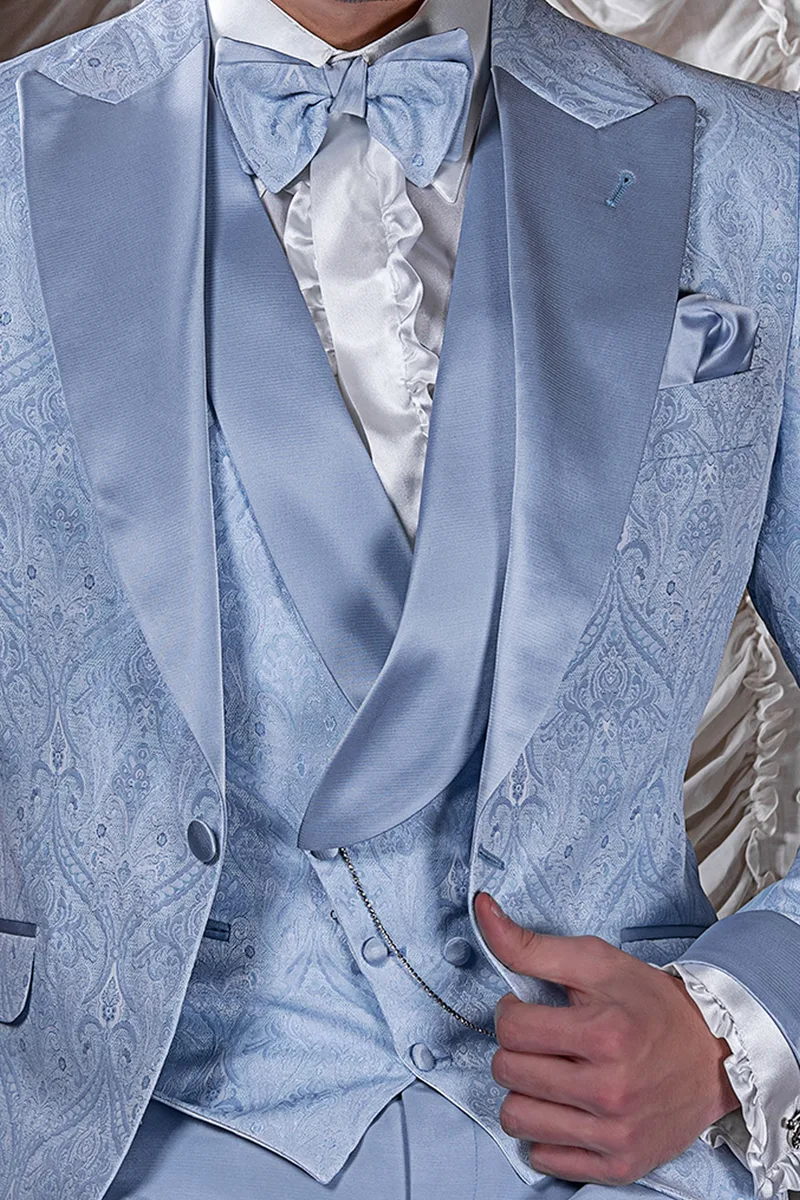 Gilet asimmetrico doppiopetto sciallato in tessuto jacquard damascato celeste e rever in raso