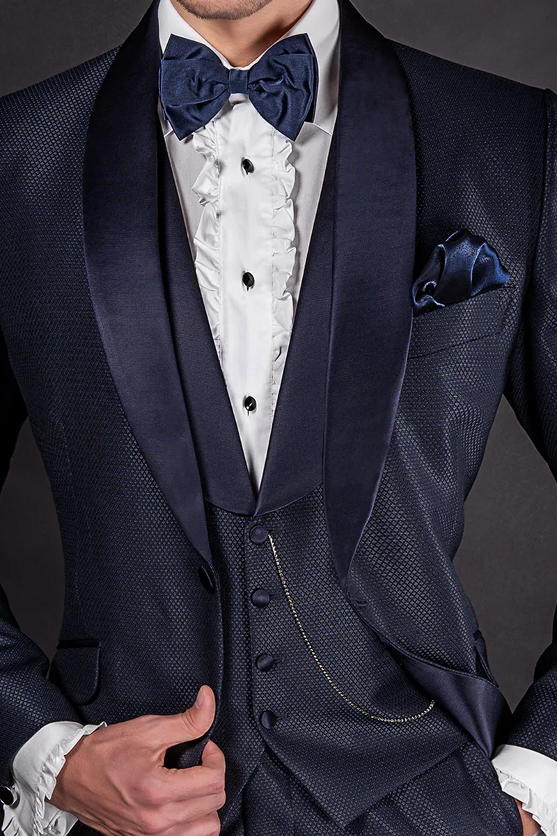 Gilet in microdisegni blu con collo sciallato
