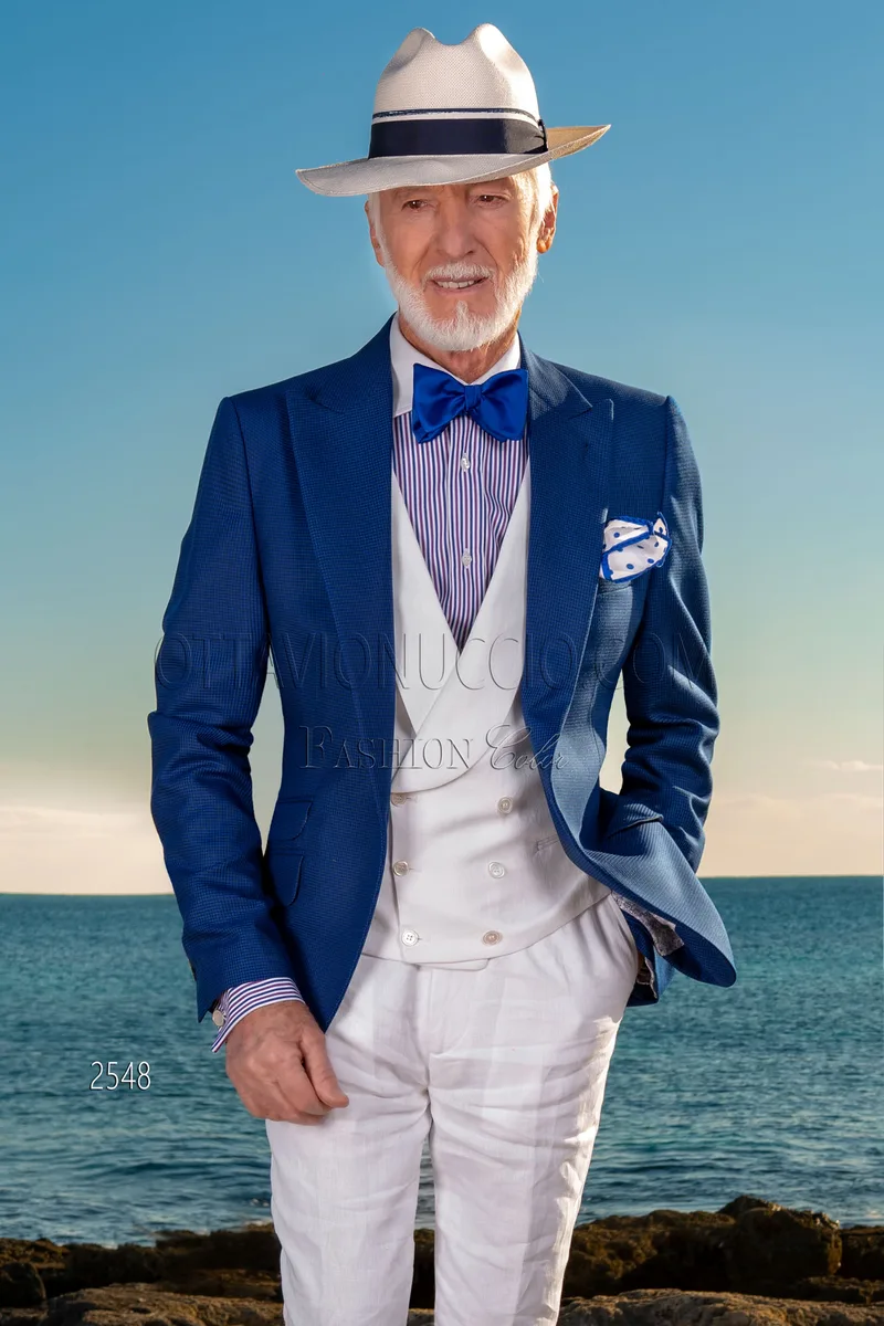 Modischer Herrenanzug mit Sakko im blauen Hahnentritt und weißer Weste und Hose 1