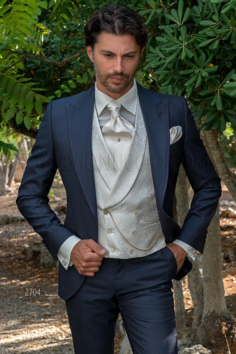 Groom formal suit in shiny blue with damask double-breasted waistcoat – Three-quarter view