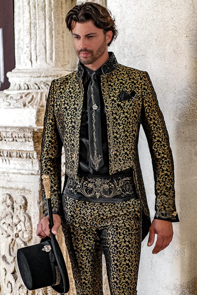 High fashion mandarin collar tailcoat in black and gold damask with golden Gothic embroidery – Three-quarter view