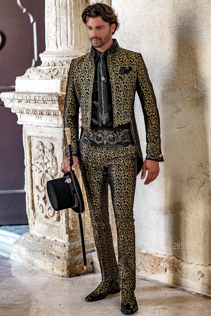High fashion mandarin collar tailcoat in black and gold damask with golden Gothic embroidery – Full-length view