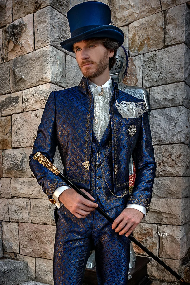 Luxury formal tailcoat in blue brocade with gold-black embroidery for a distinctive style – Three-quarter view