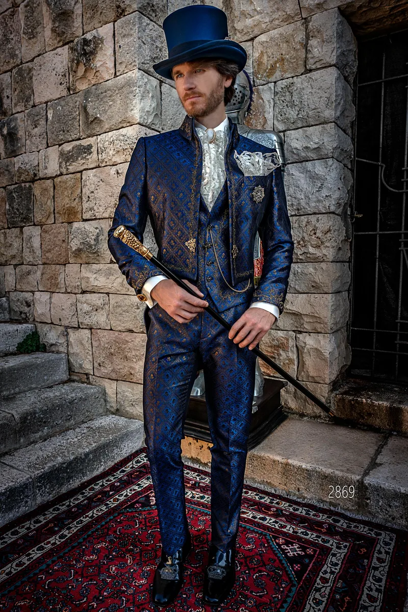 Luxury formal tailcoat in blue brocade with gold-black embroidery for a distinctive style – Full-length view