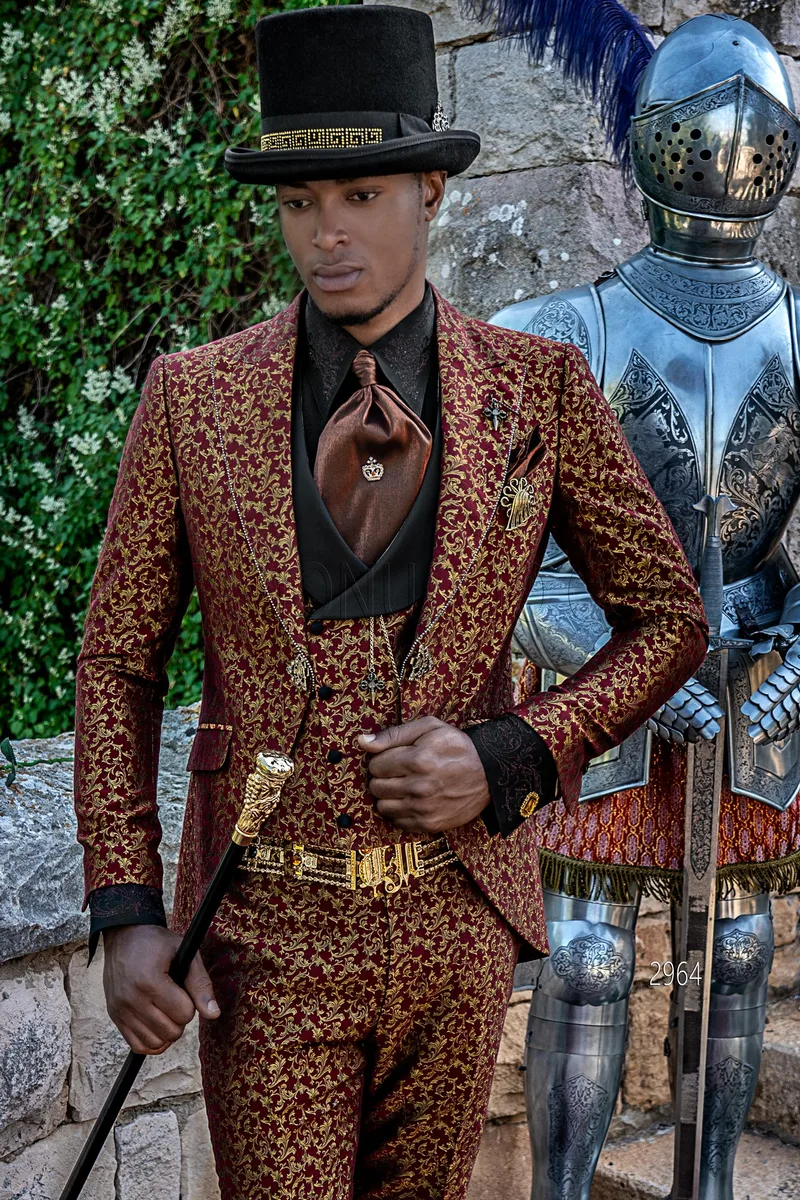 Distinctive gothic-style suit in red and gold damask with rhinestones on the lapel – Three-quarter view
