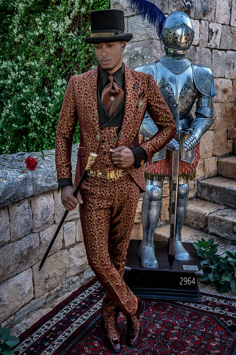 Distinctive gothic-style suit in red and gold damask with rhinestones on the lapel – Full-length view