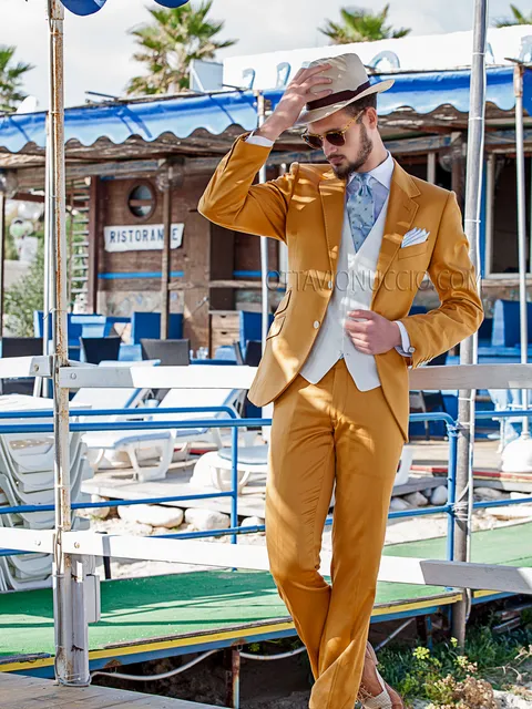 Hipster style men's suit in orange with white waistcoat