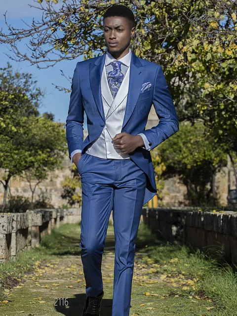 Royal blue groom suit with white waistcoat