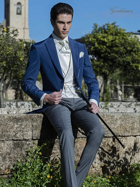 Groom suit with electric blue jacket and grey trousers