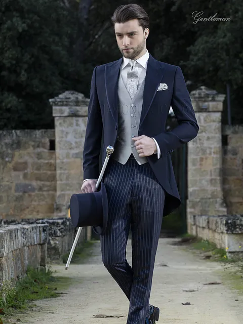 Modern blue morning suit groom suit with matching striped trousers