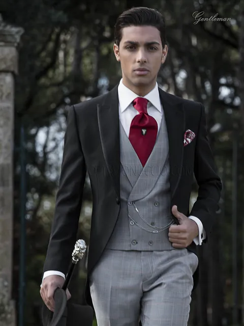 Men's formal suit, black jacket and grey Prince of Wales check trousers