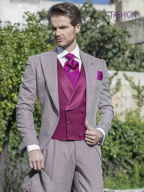 Men's fashion groom suit in houndstooth with fuchsia waistcoat