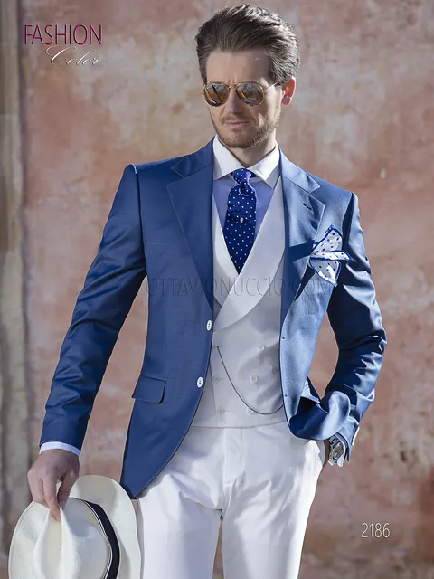 Men's groom suit, blue jacket with white trousers and waistcoat