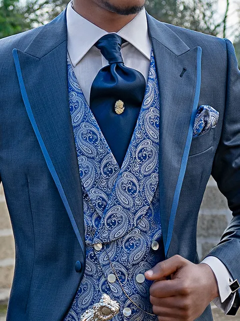 Double-breasted shawl lapel waistcoat in royal blue and silver paisley silk