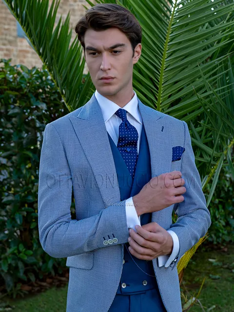 Men's royal blue houndstooth fashion jacket with blue waistcoat and trousers