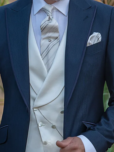 Asymmetric double-breasted shawl lapel waistcoat in ivory satin