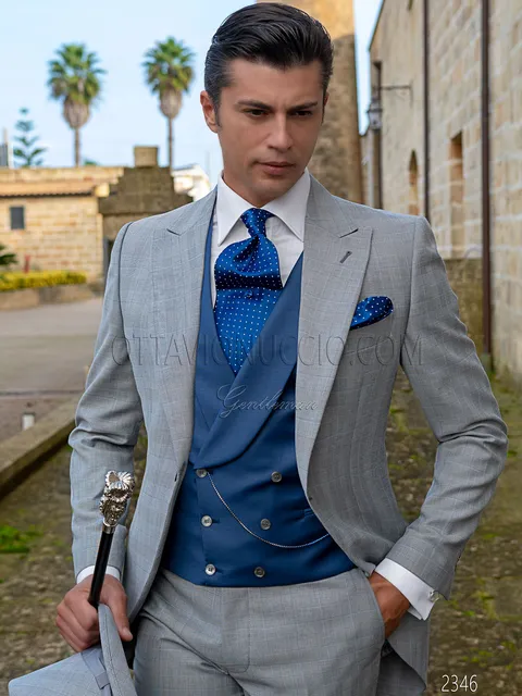 Groom morning suit in Prince of Wales check with electric blue waistcoat