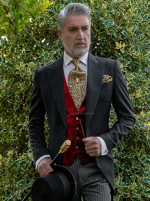 Classic black wool groom morning suit with red velvet waistcoat