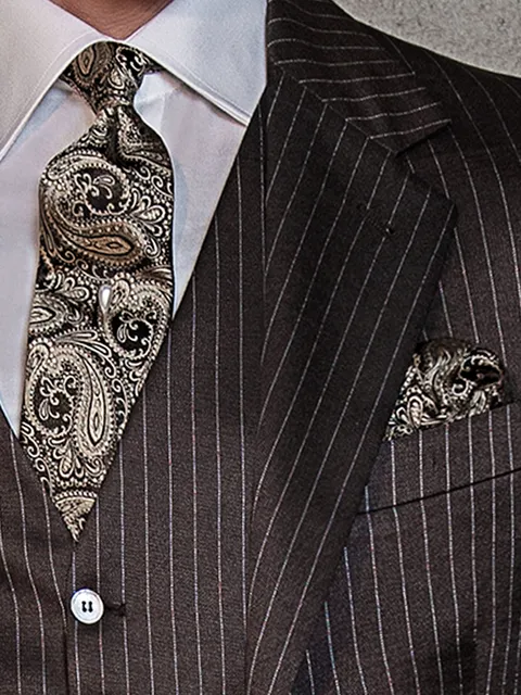Tie and Handkerchief in black silk with gold paisley pattern