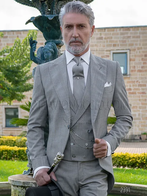 Modern morning suit for groom in black Prince of Wales check