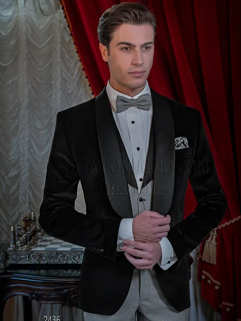 Elegant men's black velvet evening tuxedo, houndstooth waistcoat and trousers