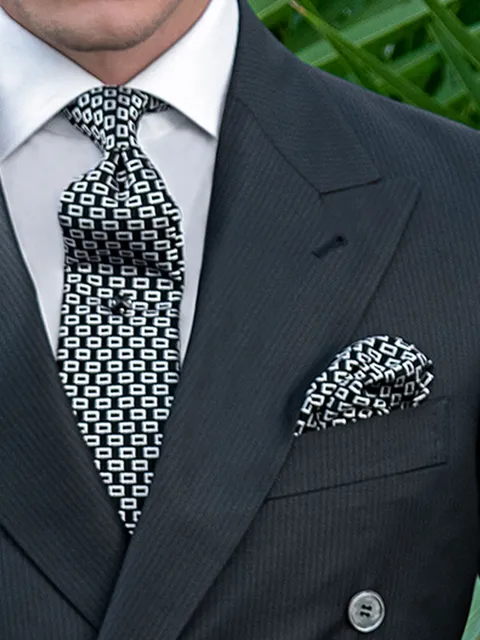 Tie and handkerchief in black silk with geometric micro-patterns