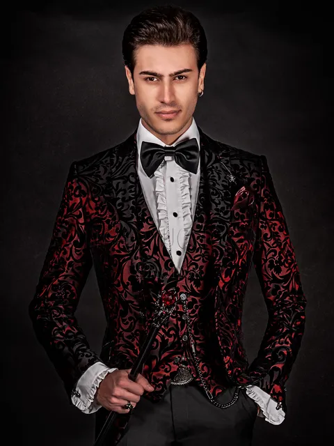 Men's red jacket with black velvet inserts and black trousers