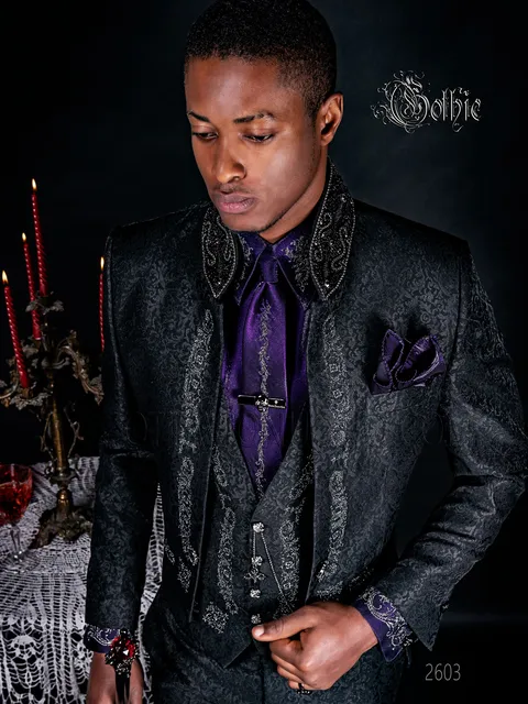 Gothic style groom tailcoat with mandarin collar in black brocade with black and silver embroidery