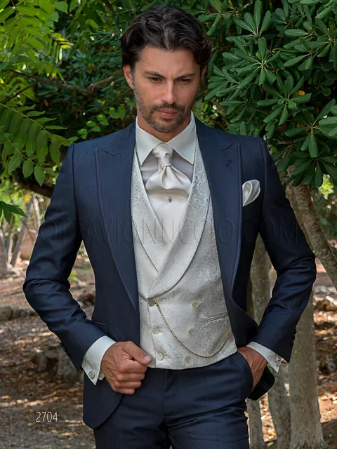 Groom formal suit in shiny blue with damask double-breasted waistcoat