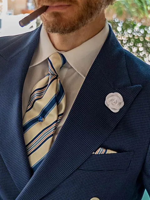 Tie and handkerchief in jacquard silk with royal blue stripes on a white background