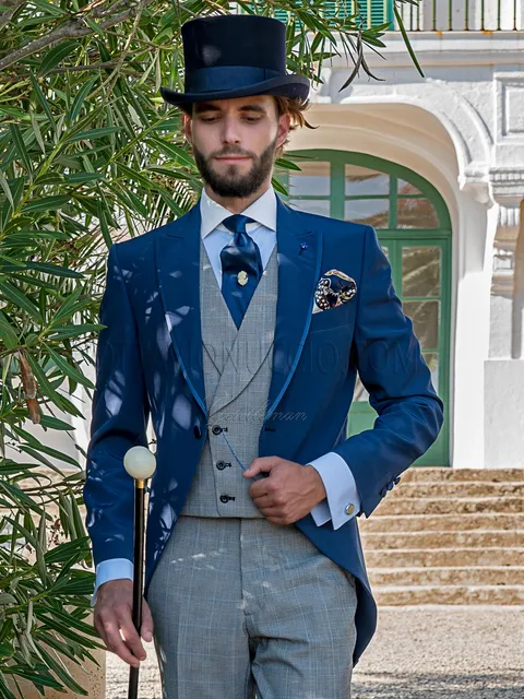 Modern royal blue morning suit with trousers and waistcoat in grey Prince of Wales check