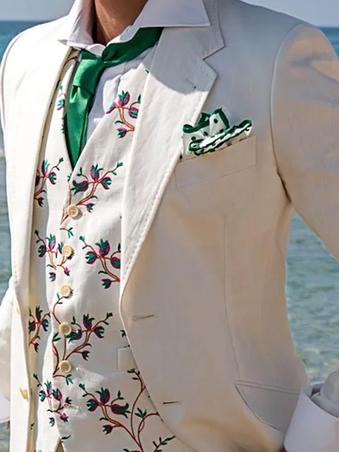 Waistcoat in white linen with floral embroidery in 3 colours