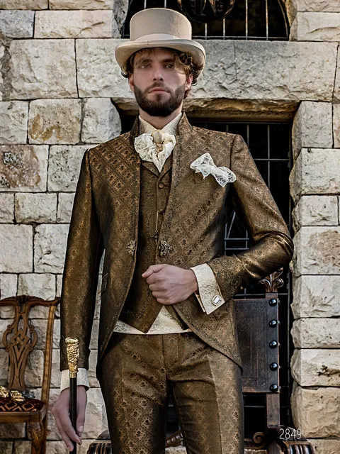Distinctive formal suit with redingote cut in gold brocade with gold embroidery